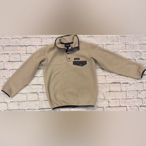 Patagonia Synchilla ladies sz XS, oatmeal with multi color geometric pattern.